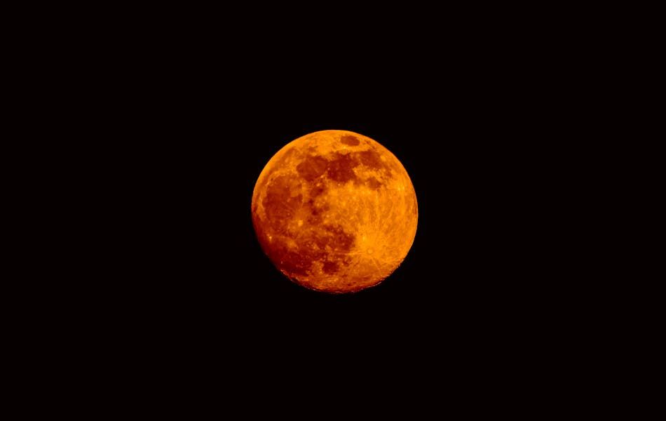 Meaning of an Orange Moon Across Different Cultures